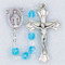 March - Aqua
These 6mm aurora borealis glass beads are available in each birthstone month color. Rosaries are 20" long. Rosaries have a silver oxidised Madonna centerpiece and Crucifix. Rosaries come in a clear top plastic box.  Perfect gift for any occasion.


