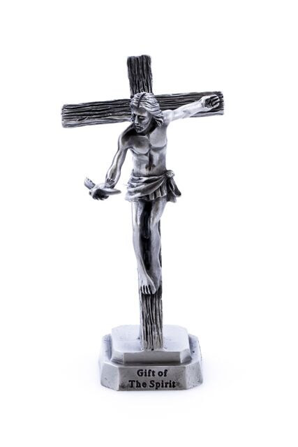Gift of the Spirit Pewter Small Standing Crucifix. This pewter Gifts of the Holy Spirit Standing Crucifix depicts Christ holding the Holy Spirit Dove for release. Standing cross is 3.5"H.