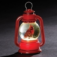 3.5"H Led Cardinal Lantern Ornament. Cardinal LED Ornament measures: 3.5"H 2.5"W 2"D. Battery included. Made of plastic