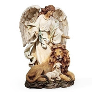  Angel figure standing over a lion and lamb who are both laying down.