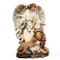 Angel figure standing over a lion and lamb who are both laying down.