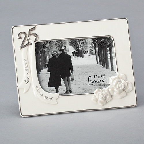 5.75" 25th Wedding Anniversary "Love is Patient, Love is Kind" Porcelain Picture Frame Porcelain Picture Frame with Gold Accents.. Porcelain 25 year Wedding Anniversary Frame measures  5.75"H X 7.75"W X .75"L and holds a 4" x 6" photo. Love is Patient, Love is Kind Banners in gold adorn the bottom of the frame with the number 25 in gold. 
