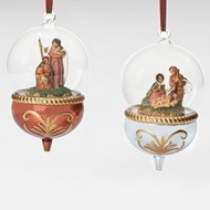 Ornament with Holy family inside a glass dome with a beautifully detailed resin bottom.