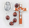 Maroon/Brown Boxwood Beads Rosary. 7 x 8mm  oval carved boxwood beads rosary has a silver oxidised Sacred Heart of Jesus Centerpiece and the cross is wood with silver oxidised corpus. Rosary measures 19".