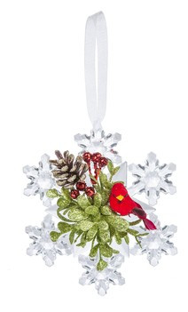 An image of a snowflake ornament with a red cardinal, red berries, a sprig of greens, and a pine cone from St. Jude Shop.