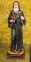 St Charbel Statue by Liscano
Saint Charbel Makhlouf or Sharbel Maklouf was raised by his widowed mother, she later remarried a man who went on to seek Holy Orders and became the parish priest of the village. Youssef was raised in a pious home and became drawn to the lives of the saints and to the hermit life, as was practiced by two of his uncles. As a young boy, he was responsible for caring for the family's small flock. He would take the flock to a grotto nearby, where he had installed an icon of the Blessed Virgin Mary. He would spend the day in prayer. In 1875, Charbel was granted by the abbot of the monastery the privilege of living as a hermit at the Hermitage of Sts. Peter and Paul, a chapel under the care of the monastery. He spent the next 23 years living as a solitary hermit, until his death from a stroke on Dec 24, 1898 from has been beautifully hand painted by the Widows of Colombian Violence. It's measurements are  9"H  x 3" round diameter base.