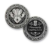 Claddagh Pocket Token.  1" Bright Finish Pocket Token features a double-sided pewter design the Claddagh surrounded by an embossed knot-work border  Front of coin has Celtic knots around the edge with the Claddagh symbol in the middle.  Flip side of coin says:  Friendship, Loyalty, Love are added. The Claddagh pocket token is made of pewter and measures 1 1/8" diameter.