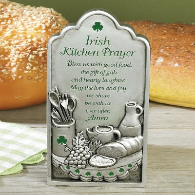 Cast metal with baked enamel silver finish with green epoxy accents. Plaque can hang or stand. Prayer: "Bless us with good food, the gift of gab and hearty laughter. May the love and joy we share be with us ever after. Amen."Measurements: 3 3/4"W X 7"H. Comes boxed