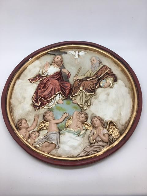 The Holy Trinity Wall Plaque by Liscano ~   This plaque is made in Colombia, South America. The Holy Trinity Plaque has been beautifully hand painted by the Widows of Colombian Violence. It's measurements are  6"D round

