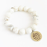 White Turquoise with Silver Cardinal Charm ~ "when Cardinals appear a loved one is near" on charm.
Semi-precious gemstones and charm & logo disc charm.  12mm beads. 
Size: approximately 7.25”.
Each natural gemstone is unique and therefore no two are alike. Stones, colors, and sizes may vary. Handmade