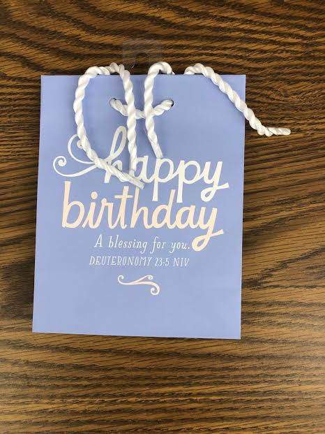 Wrap birthday gifts quickly and beautifully with this inspiring gift bag—perfect for jewelry and other smaller-sized items!
Message: A Birthday Blessing for You!
Size:  6 5/8"H x 5 1/2"W x 3"D
Specialty small bag
Bag features foiling
Sturdy rope handle
Coated paper

