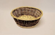 This basket is a two tone round basket. The two tone basket measures 13" dia x 4 1/2" deep. Lightweight and easy to handle!