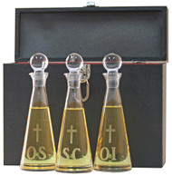 Image of three Holy Oil bottles engraved with the letters "OI", "OS", and "SC". The pictured case for the bottles is not included.