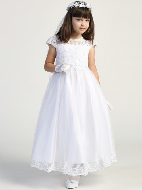 Product Description: 
This First Communion dress features detailed embroidery along the bodice with flower appliques along the neckline flowing into a tulle skirt with a lace hem. Shop this style online at St. Jude’s Shop! 

Embroidered Tulle Bodice 
Flower Applique Neckline
Rhinestone and Flower Decor at Waistline
Tulle Skirt With Embroidered Edges 
String Bow
First Communion is a momentous occasion. Your daughter or granddaughter will feel extra special in this beautifully intricate embroidered design, with floral lace appliques and Rhinestone waistline. This style ties back to create a small bow on the backside to not take away from the tulle skirt's lace hem. 
Tea Length 
Accessories Sold Separately
Made in the U.S.A. 
3 Dress Limit Per Order
