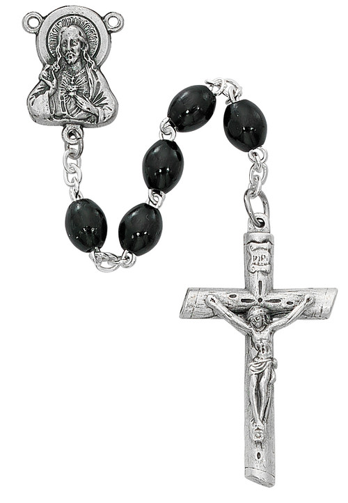4x6mm round Black wood bead rosary. Rosary has a silver ox Sacred Heart of Jesus center and crucifix. Rosary measures 19 1/4".