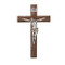 11.5"H  Beveled Wood look Wall Cross with Silver Corpus. Crucifix is made of a resin/stone mix. 