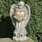 12.25"H  Memorial  Angel  Holding Heart. The inscription on the heart that the angel is holding says: " Forever in Our Hearts". Memorial Angel is made of a resin/stone mix. 