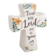 6"H Blessisngs Cross-Trust in the Lord. Made of Porcelain. Flowers at each point on the cross. The words "Trust in the lord with all your heart symbol." 