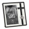 Confirmation Frame from the Caroline Collection.  This 7.25"H black and silver frame holds a 4" x 6" photo. There is a black cross with a silver dove that adorn the one side of the frame. The Confimation Frame is made of a zinc alloy-lead free. 