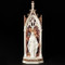 Our Lady of Grace Arched Window LED Figure. The beautiful figure stands in front of a stained glass window. This figure lights up with 3AAA batteries NOT INCLUDED.  Figure stands 11.75"H and is made of a resin/stone mix.