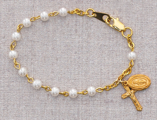 This bracelet has 4mm glass pearl beads and a gold plated pewter crucifix and mircaulous medal charms attached. Comes in a gift box. Measures 5 1/2".