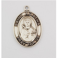 St Agatha Sterling Silver Oval Medal. St Agatha Medal comes on an 18" rhodium chain. Comes in a velour gift box. Medal measures 1"L. Made in the USA.