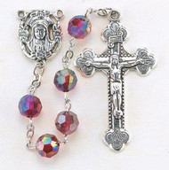 January - Garnet 
These 8mm aurora borealis faceted acrylic beads are available in each birthstone month color. Rosaries are 20" long. Rosaries have a silver oxidised Madonna centerpiece and Crucifix.  Perfect gift for any occasion.