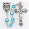 March - Aqua
These 8mm aurora borealis faceted acrylic beads are available in each birthstone month color. Rosaries are 20" long. Rosaries have a silver oxidised Madonna centerpiece and Crucifix.  Perfect gift for any occasion.
