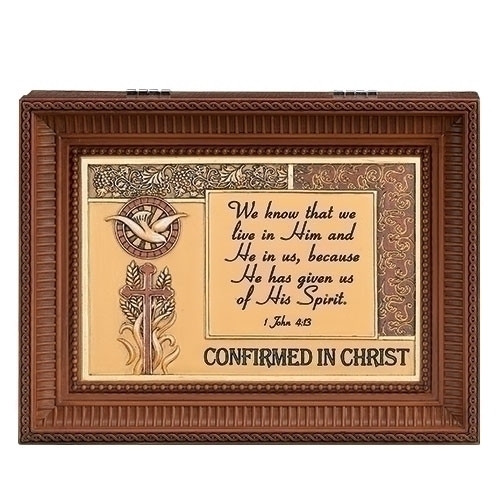 "Confirmed in Christ" Brown Wood Wind up Music Box. Music Box plays "How Great Thou Art". Saying reads: "We know that we live in Him and He in us, because He has given us of His Spirit. 1 John 4:13." Measurement: 8"L X 6"W X 3"H. Made of Plastic and Metal
