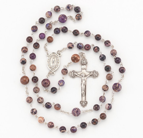 Imperial Jasper Blue Freshwater Pearl Rosary-Rosary with 6mm freshwater pearls. Detailed Miraculous Centerpiece with a fancy 1-7/8" sterling Crucifix. Rhodium plated brass findings. Comes with a deluxe velour gift box. Made in the USA.