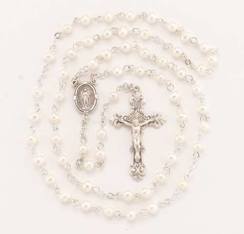 White Freshwater Pearl Rosary - Rosary with 6mm freshwater pearls. Detailed Miraculous Centerpiece with a fancy 1-7/8" sterling Crucifix. Rhodium plated brass findings. Comes with a deluxe velour gift box. Made in the USA.