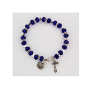 Crystal sapphire beads with crystal stone spacer beads.  Real crystal capped Our Father bead. Silver oxidised crucifix and miraculous medal. Rosary bracelet comes carded. This beautiful rosary bracelet comes gift boxed