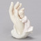 Porcelain Statue of a Girl in the "Palm of His Hand". Perfect Gift for a Baptism!. Dimensions: 4.38"H 3"W 2.25"D