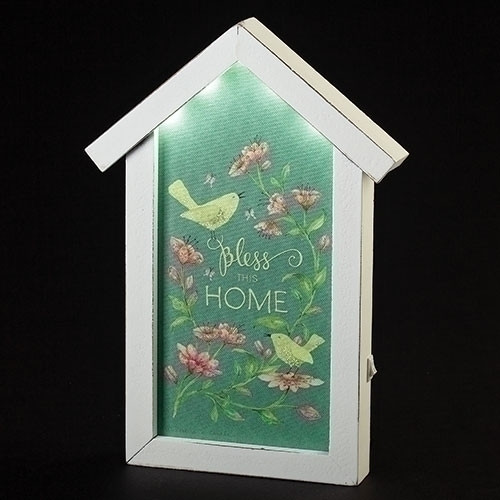 LED Bless This House Plaque. Plaque stands 11"H. Made of medium density fiberboard. Battery Operated. Needs 2AA batteries not included.