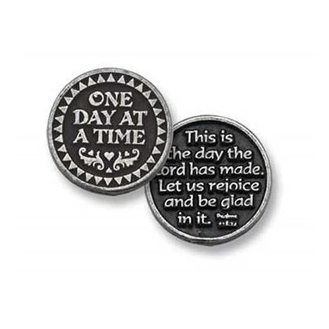 One Day At A Time bright finish pewter pocket token measures approx. 1" in diameter.
Front reads: One Day at a Time. Back reads: This is the day the Lord has made. Let us rejoice and be glad in it.
Poly-bag
