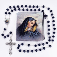 Our Lady of Sorrows Rosary in Pouch. Crystal blue bead rosary has a silver oxidized crucifix and center. Our Lady of Sorrows Rosary comes in a Our Lady of Sorrows Pouch!