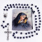 Our Lady of Sorrows Rosary in Pouch. Crystal blue bead rosary has a silver oxidized crucifix and center. Our Lady of Sorrows Rosary comes in a Our Lady of Sorrows Pouch!