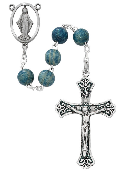 7 millimeter Light Blue Wooden Beads Rosary with silver oxidized Crucifix and Center. Rosary presents in a deluxe gift box.  Made in the USA.