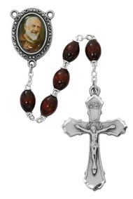 Brown Oval Beads Rosary with silver oxidized Crucifix and Padre Pio Center. Rosary presents in a deluxe gift box.  Made in the USA.