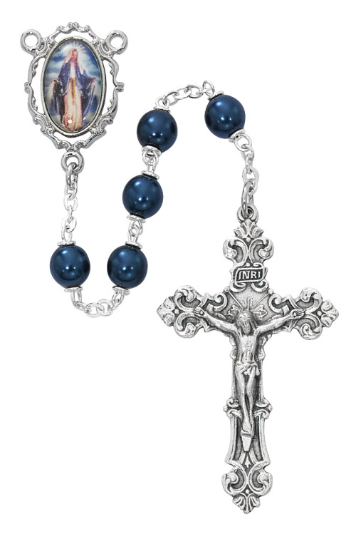 7mm Blue Pearl Glass Beads Rosary with rhodium palted pewter Crucifix and Center. Rosary presents in a deluxe gift box.  Made in the USA.