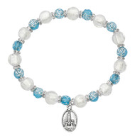 Aqua Rose and Silver Beads with White Venetian Glass beads make up this beautiful bracelet. Our Lady of Fatima medal is attached