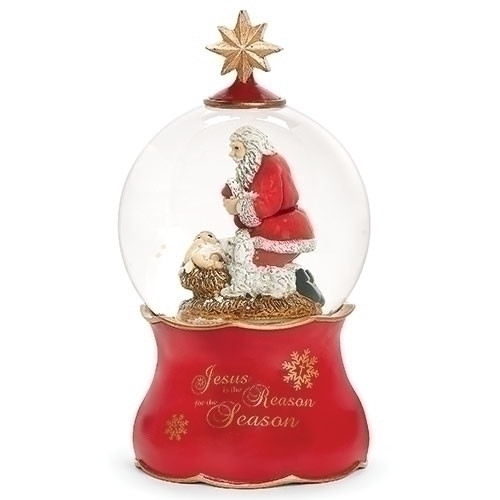 Wind up Kneeling Santa Dome. Message on the bottom says "Jesus is the Reason for the Season".  Dimensions: 7"H x 4"H x 4"L.  Made of Glass, Water, and Metal. 