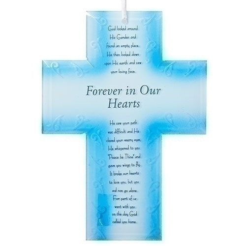 Forever In Our Hearts Memorial Cross. The Forever in Our Hearts Memorial Cross measures  7.5"H 5.25"W 0.5"D.The words on the bottom of the Memorial Keepsake Frame say (in part)  "God looked around His garden and found an empty place.  He then looked down upon His earth and saw your loving face. He saw your path was difficult and He closed your weary eyes...." Made of beveled blue colored glass.