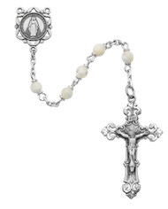 Genuine Mother of Pearl Rosary has a Pewter Crucifix and Center.  19" in Length. Deluxe Gift Box Included