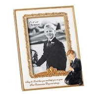 4" x 6" Communion Frame for Boy. Frame has a praying boy in the corner of the frame. The words "May the Lord bless you and keep you on your First Communion Day and always," are written across the bottom of the frame. Made of a resin/stone mix. 8"H