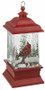 LED Light Up Cardinal Lantern.  Dimensions: 4 1/4" W x 4 1/4" D x 9" H. Requires 3 AA Batteries (Not Included). Weighs 3 pounds