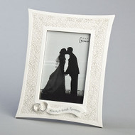 10"H  Wedding "Lace Look" Photo Frame adorned with two silver wedding rings and the words "Always and Forever" attached on a banner across the bottom of the frame.  Frame holds 5" x 6" photo. Frame is made of a resin/stone mix and measures 10"H.