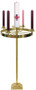 A standing advent wreath with a gold appearance.