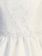 close up of girls three-quarter length sleeve lace and tulle white communion dress bodice