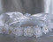 24" Veil with Organza Flowers, Rhinestones & Pearls on Crown. 
Satin Bow at the back. 
Made in the USA